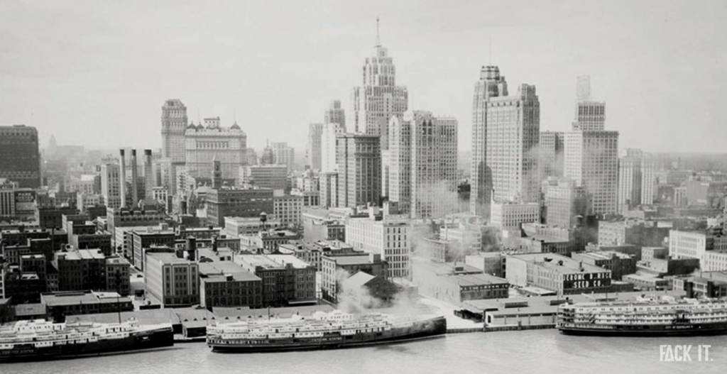 A black-and-white view of Detroit in the 1980s, showcasing the city’s industrial skyline and urban landscape during a time of economic decline.